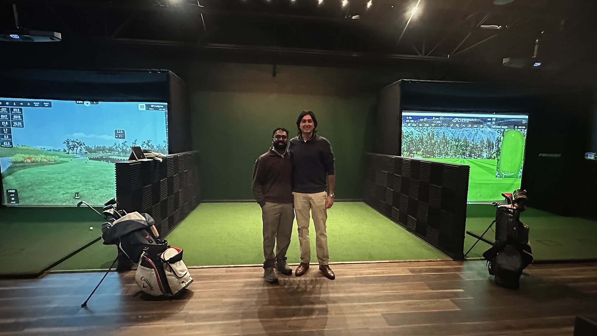 Pulkit and Sid, co-founders of That Golf Place, inside the Westmont clubhouse between Bay 1 and Bay 2